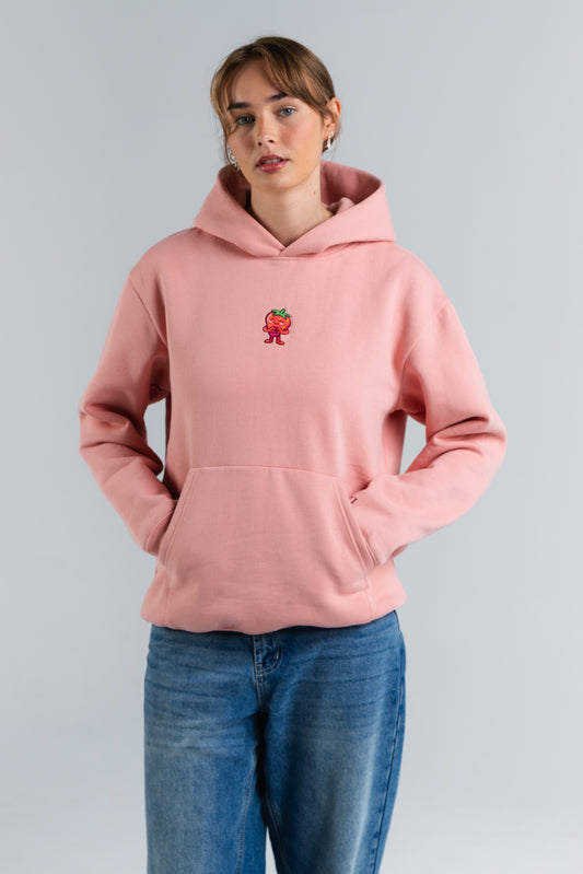 Person wearing a pink hoodie with a small red graphic on a plain background#color_pink